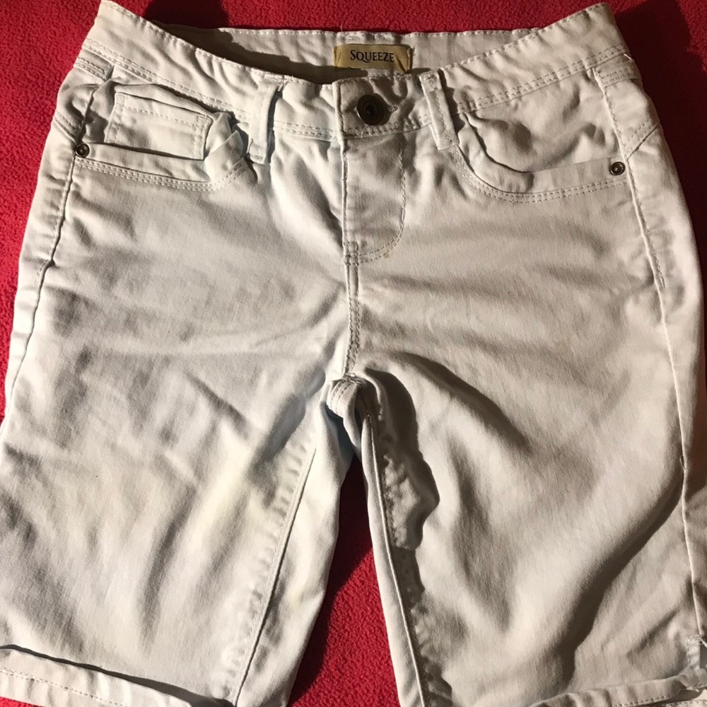 baby blue shorts right above knee